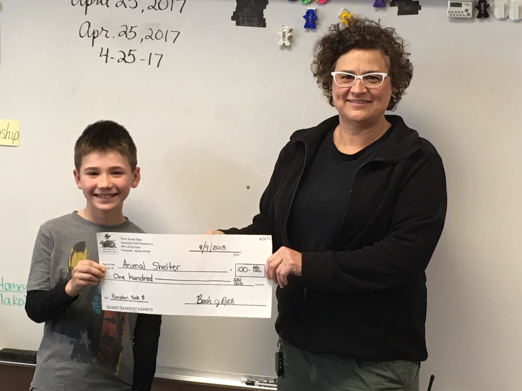 U-Park third-graders donate funds from pumpkin sales to Animal Shelter